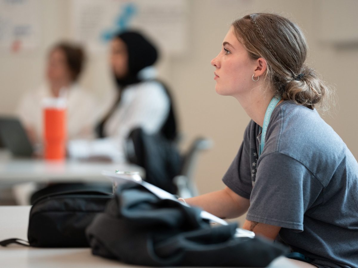 Student from VSI precollege summer course listening.