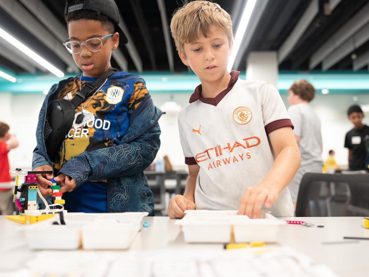 Boys building with Legos